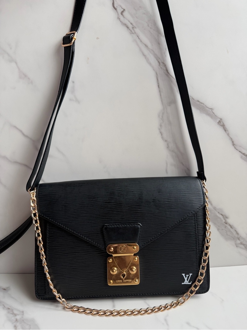 LV Epi Dragonne Sellier leather clutch as crossbody